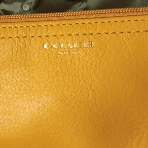 Coach Yellow Pebbled Leather Clutch